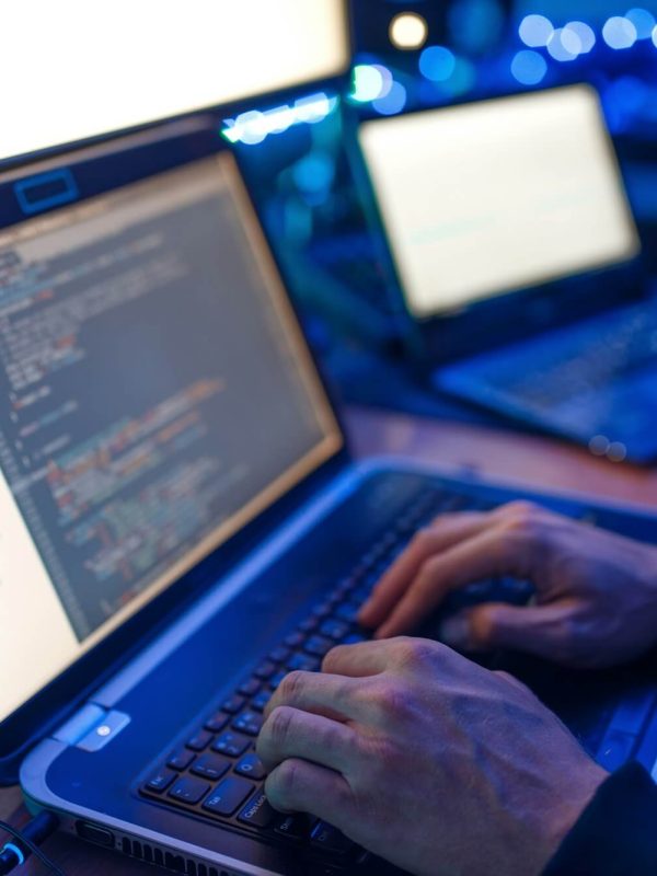 programmer-hands-on-keyboard-network-security.jpg